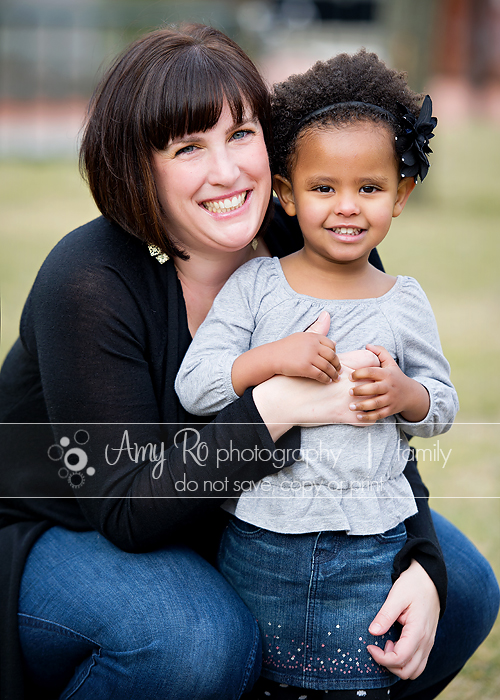 Mixed race mother and daughter photo