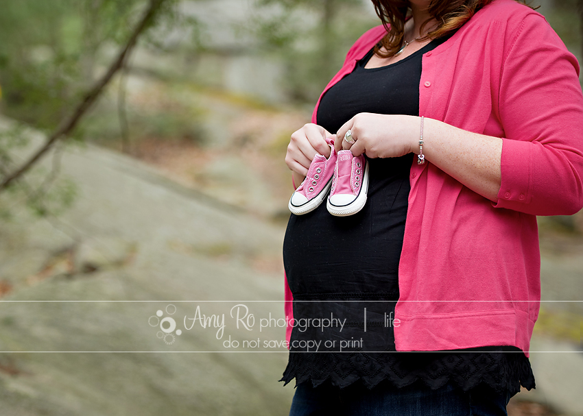 Maternity image with pink sneakers