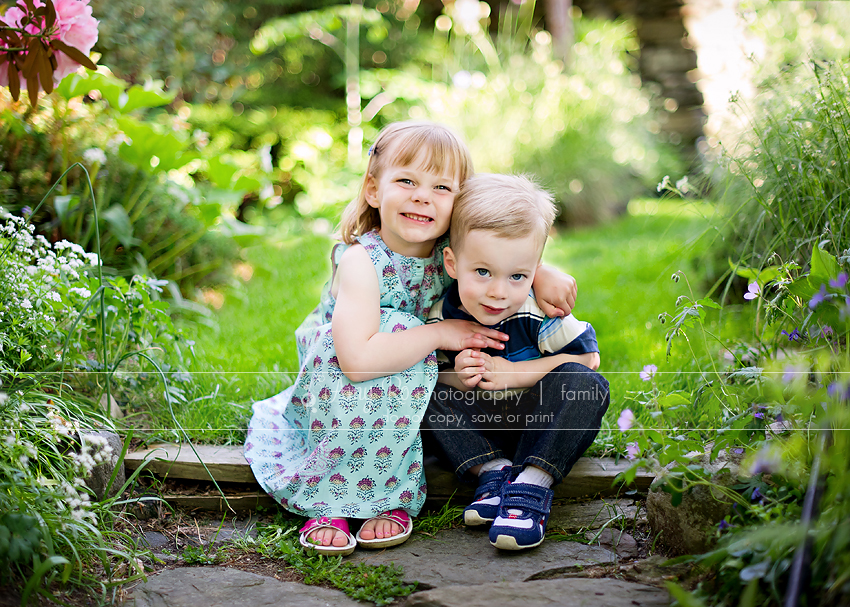 Brother and sister sibling picture in garden