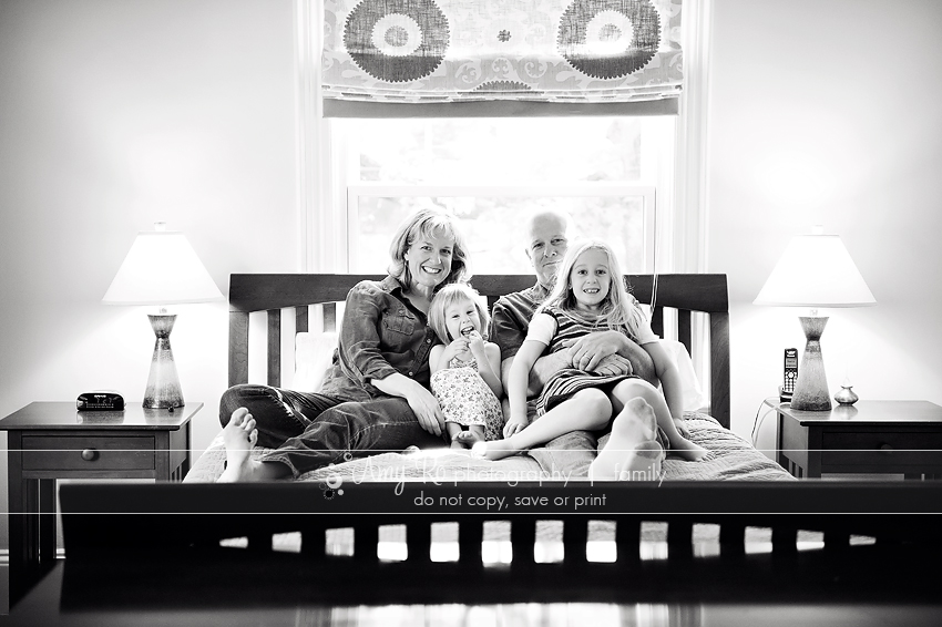 Family photo on a bed