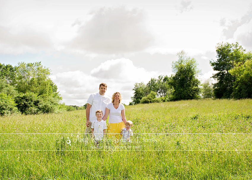 Family on hill with trees in sun, Connecticut photography