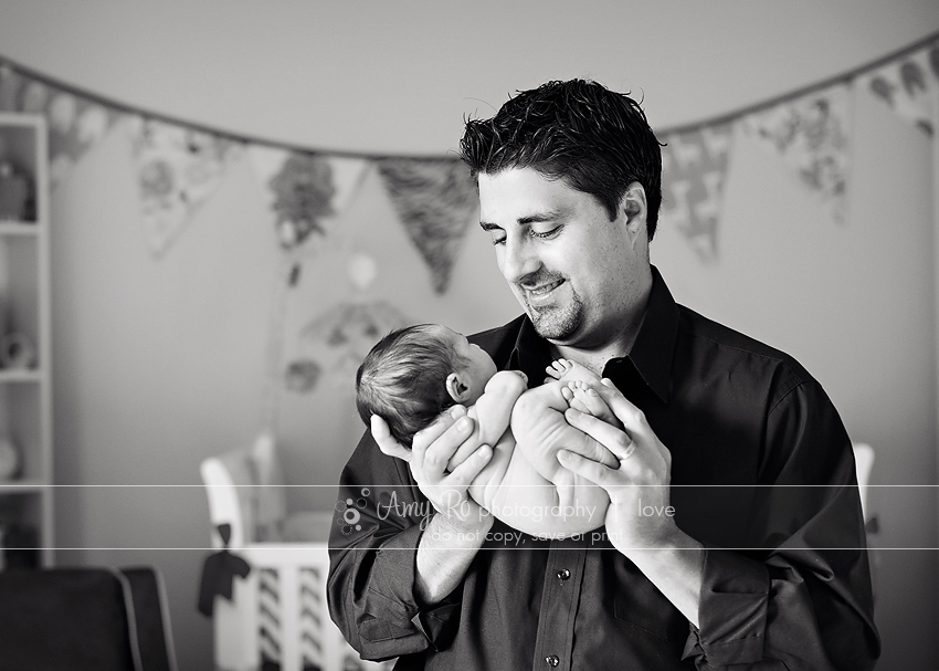 South Shore newborn photography, dad and newborn in nursery