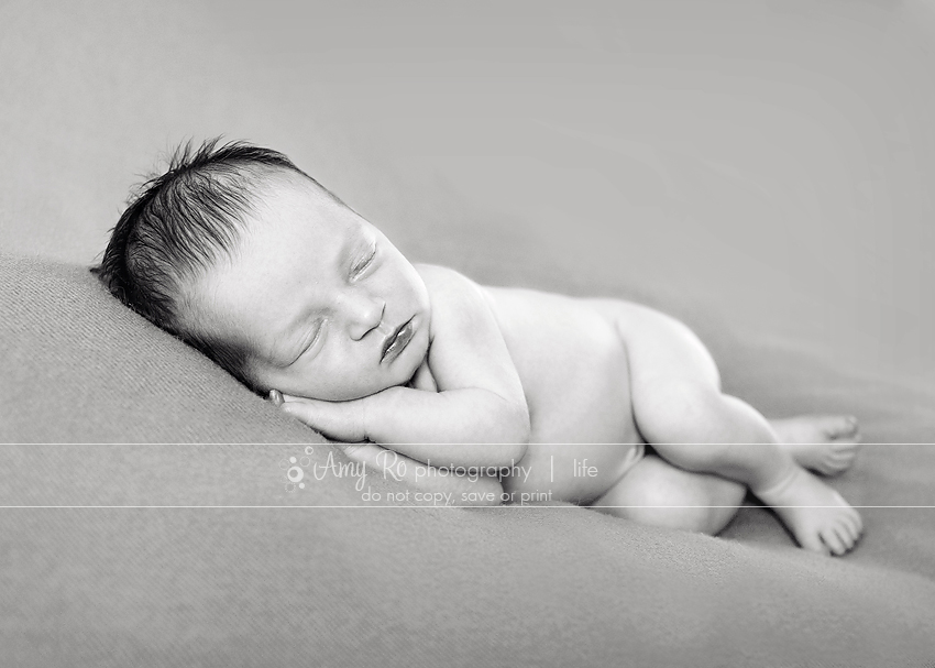 Black and white image of newborn girl sleeping, Connecticut Newborn Photography