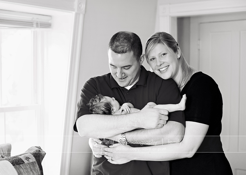 Black and white family portrait newborn