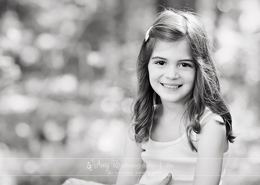 Black and white portrait of older daughter