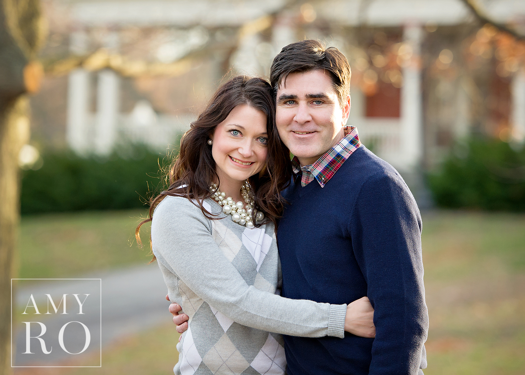 Image of husband and wife taken during family session during Fall in Providence Rhode Island