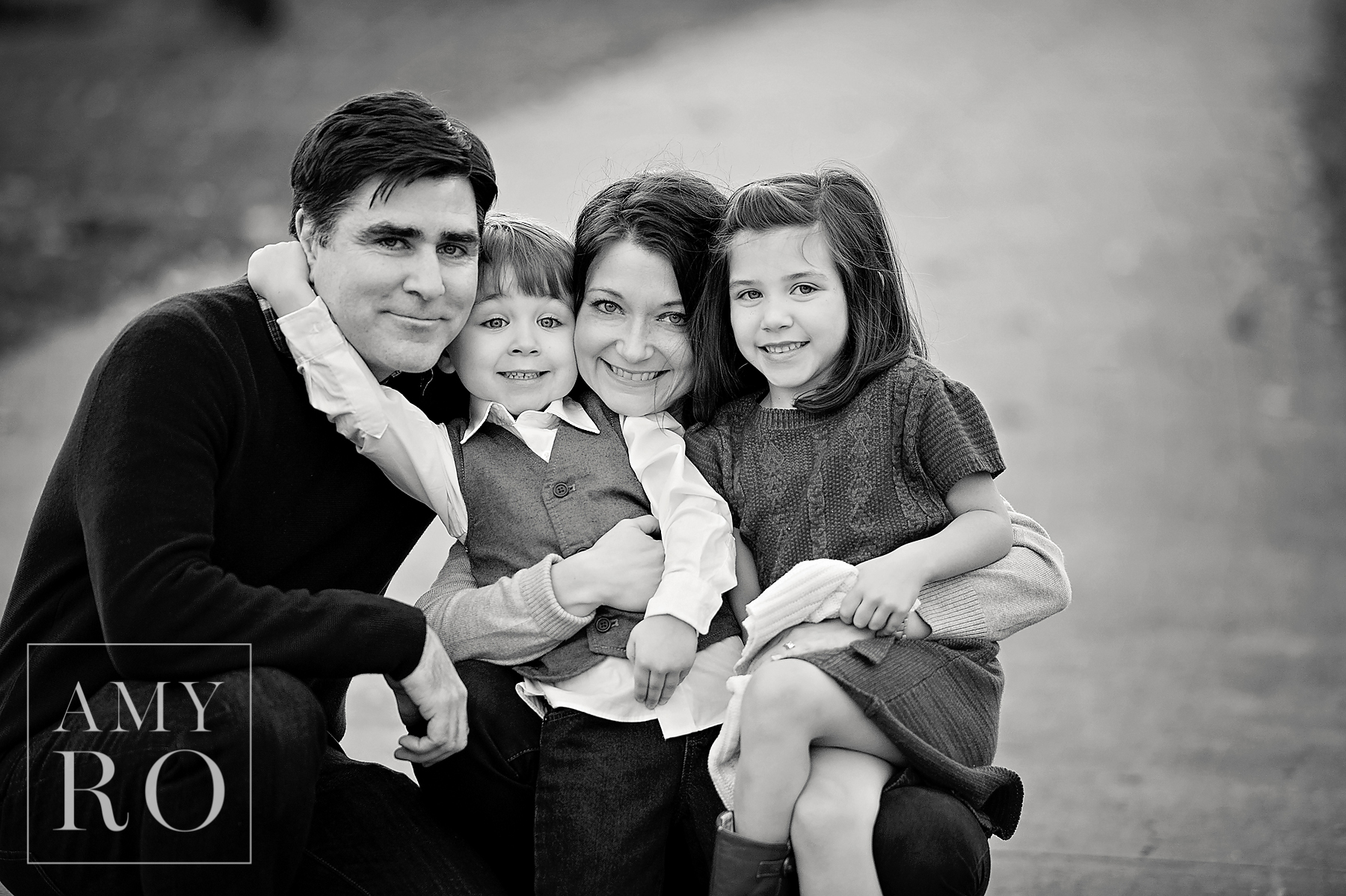 Black and white close family image during a family session in Rhode Island