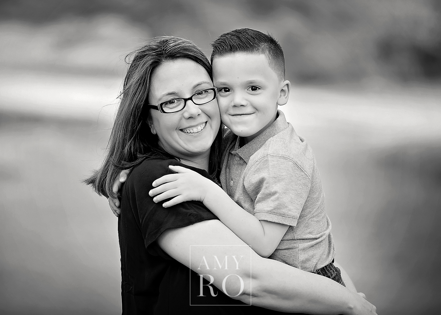 Black and white image of mother and son in Rhode Island during a lifestyle family session