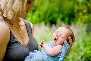 Newborn portrait of baby yawning, outdoor newborn photos, Rhode Island photography