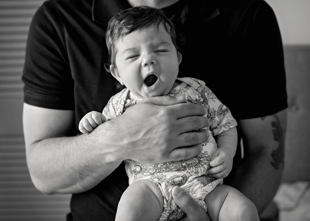 Baby yawning during a newborn photo session in Rhode Island
