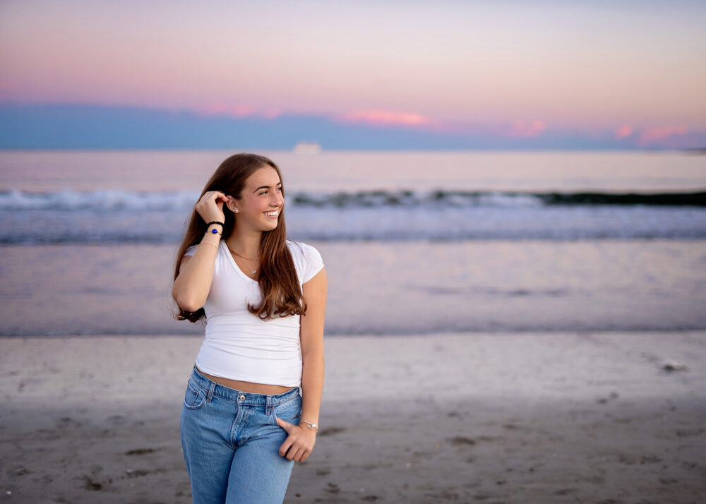 Newport beach at sunset with LaSalle senior girl