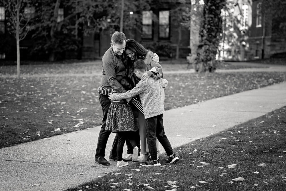 Family snuggles in the fall in family session in Providence RI