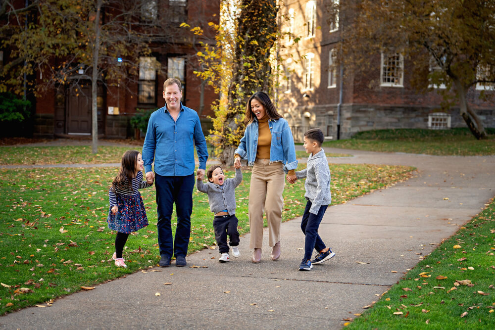 Family walking together holding hands in Providence RI