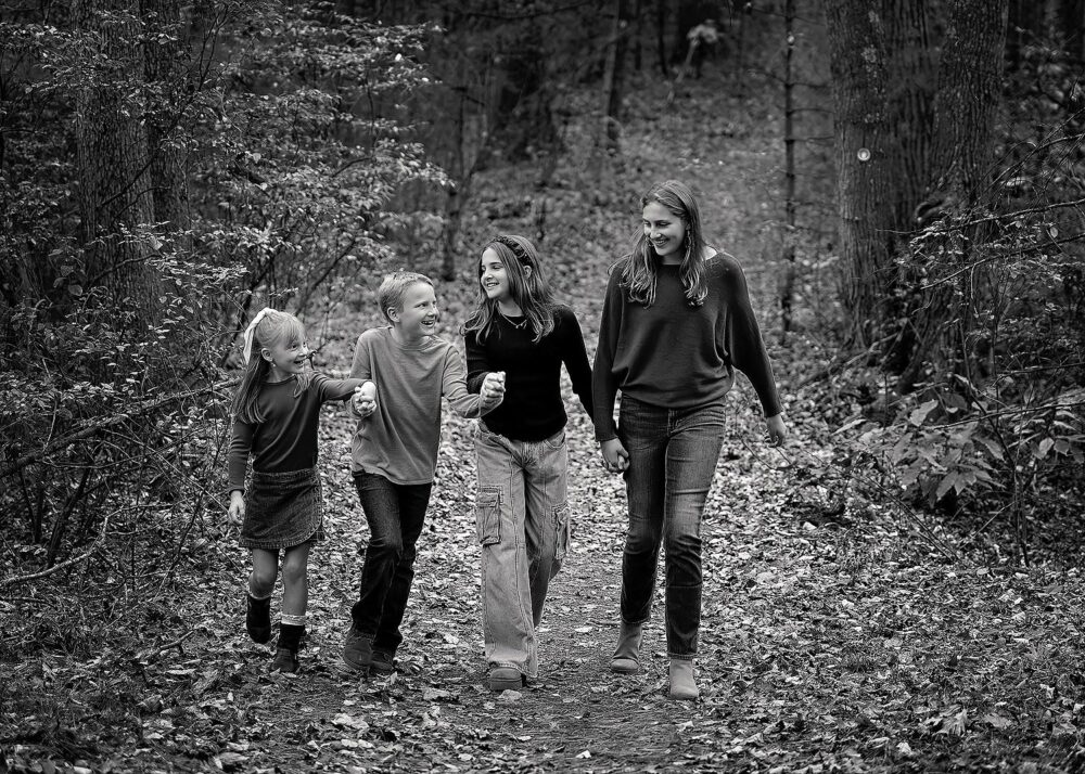 Four siblings walking in the woods Shrewsbury Massachusetts photo session